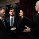 Sen. Doug Jones (D-Ala.) participates in a mock swearing-in ceremony with Vice President Mike Pence (right) as Jones’ wife, Louise, and son Carson look on at the Old Senate Chamber of the U.S. Capitol in Washington, D.C., on Jan. 3, 2018. (Alex Wong/Getty Images)